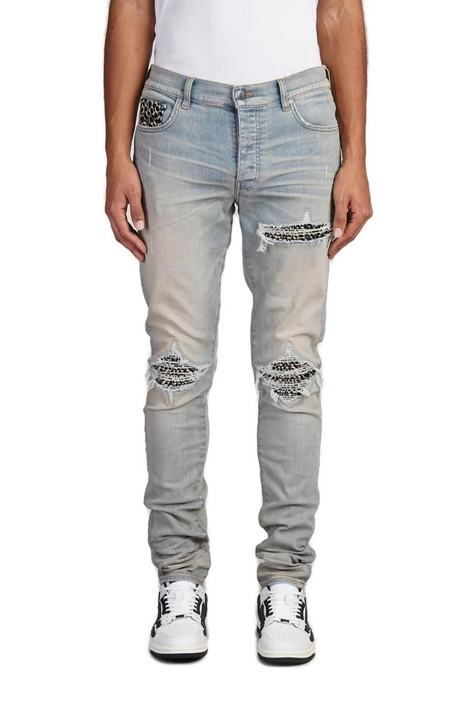AMIRI Amiri Leopard-Detailed Distressed Jeans 1