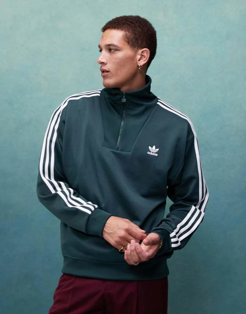 Adidas adidas Originals funnel neck tracktop in mineral green 1