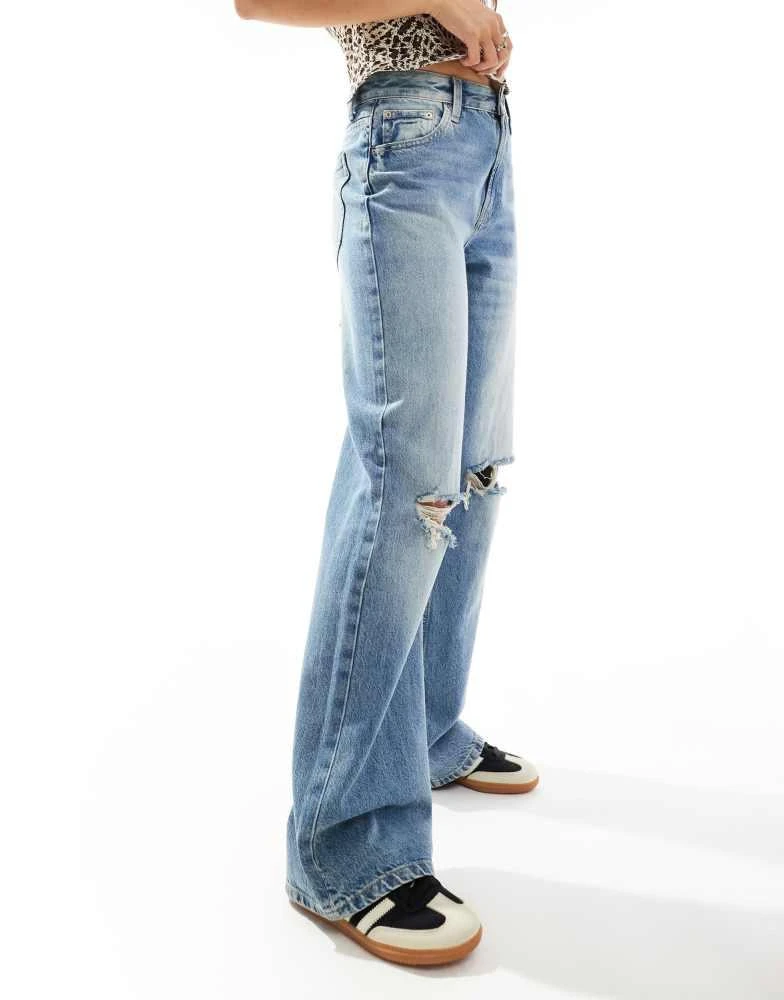 Bershka Bershka ripped knee wide leg jeans in mid wash 4