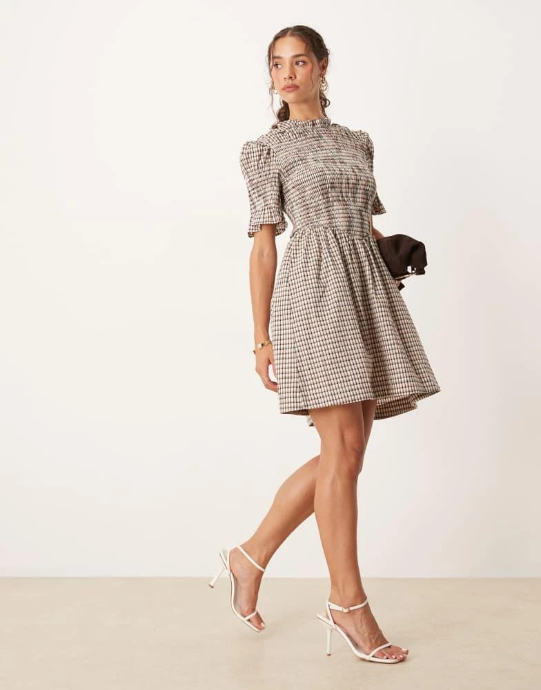 Shop Princess Polly Laurita shirred lettuce edge hem drop waist mini dress  in brown gingham on Sale at BeyondStyle  Get 60% Off Princess Polly Laurita  shirred lettuce edge hem drop waist