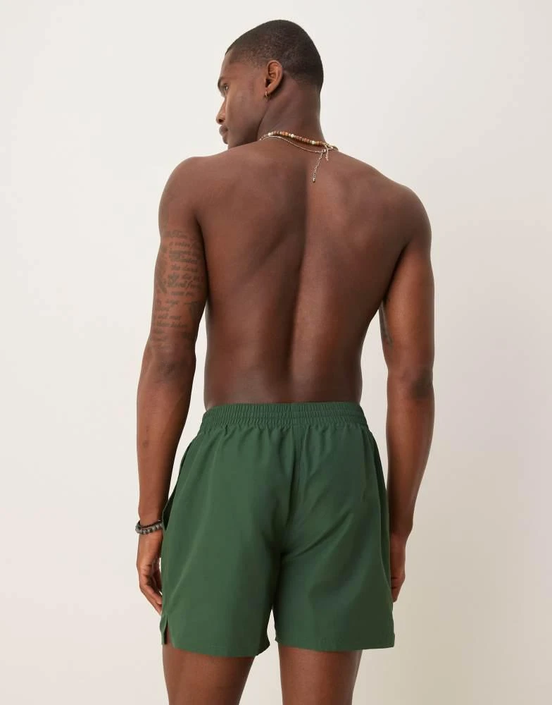 NIKE Nike 5 inch Volley swim shorts in green 4