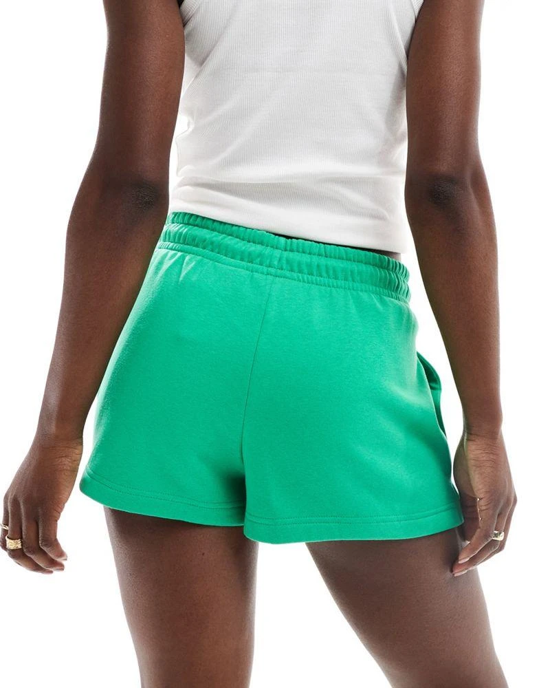 The North Face The North Face high waist jersey shorts in emerald green Exclusive at ASOS 4