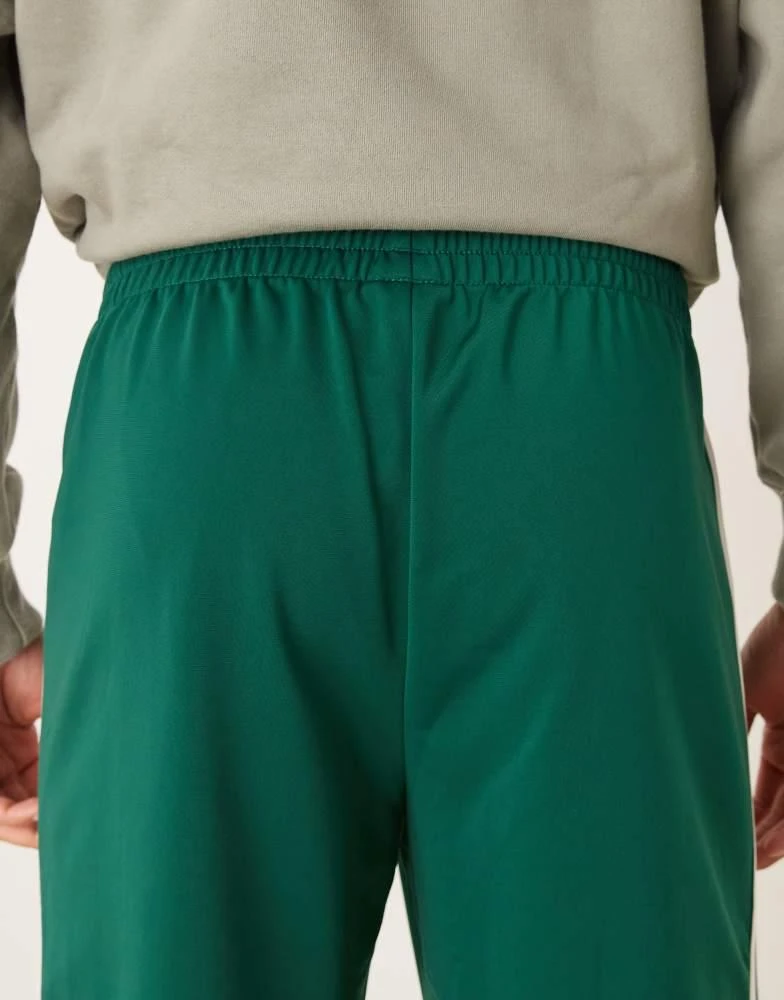 Adidas adidas Originals Firebird track pants in green 5