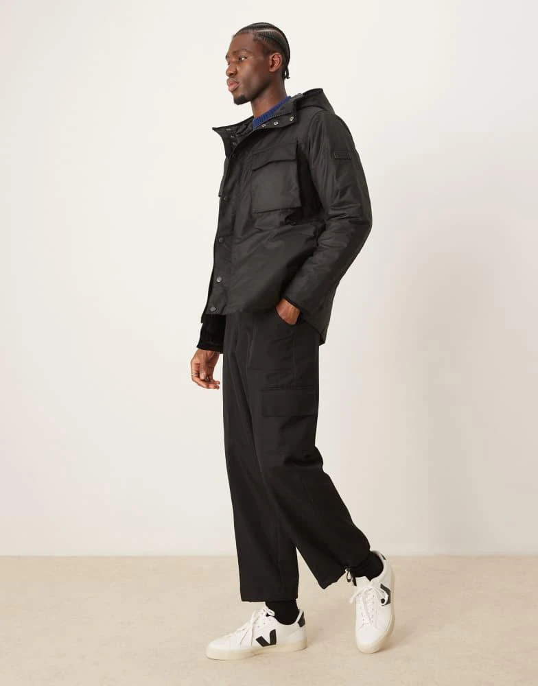 Barbour Barbour International longwell wax jacket in black 4