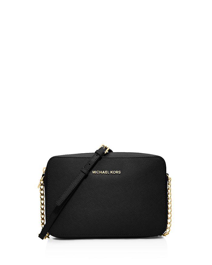 Michael kors crossbody black and gold sale