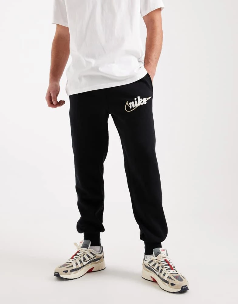 NIKE Nike Club joggers with swoosh detail in black