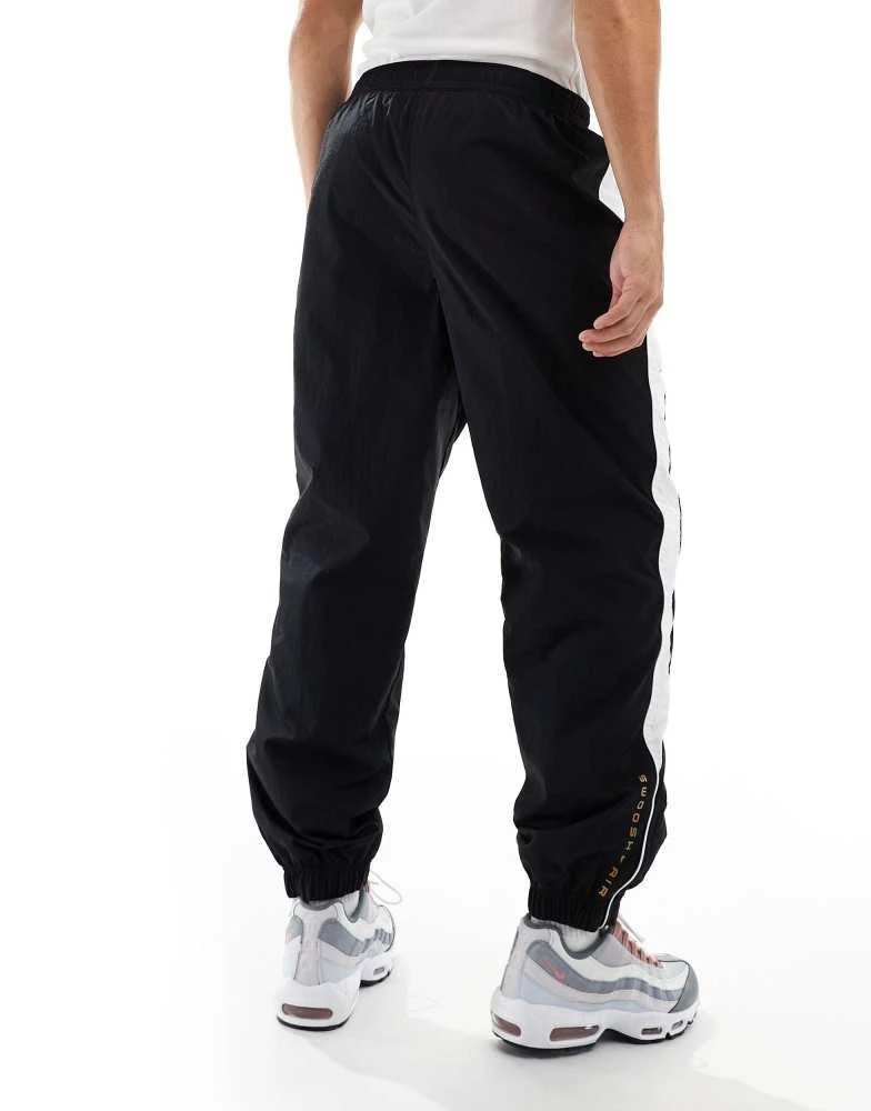 NIKE Nike Swoosh Air woven joggers in black and white 2