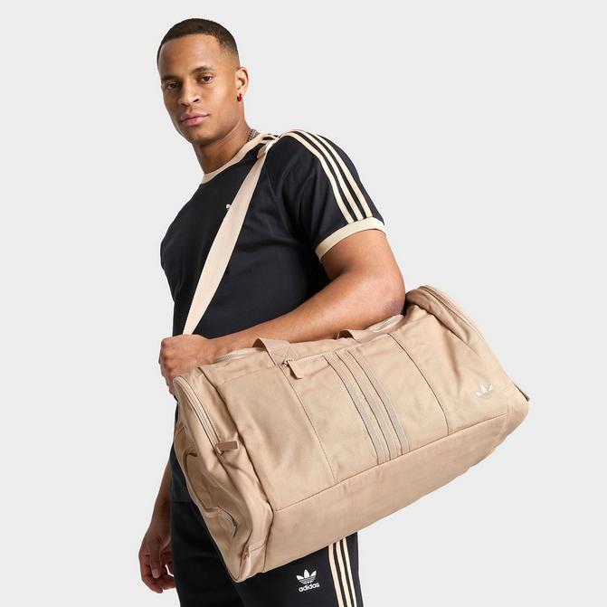 Adidas fashion canvas messenger bag.