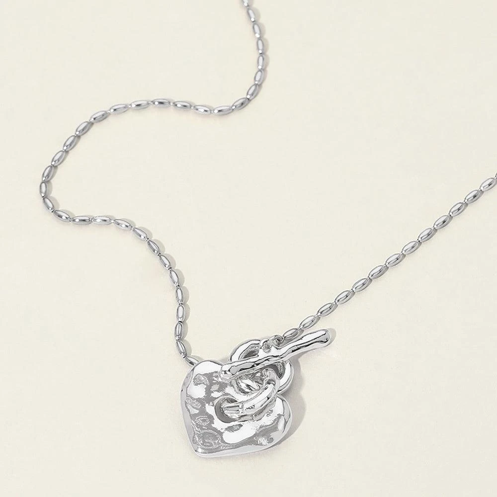 FASHNZFAB Hammered Metal Heart Toggle Necklace