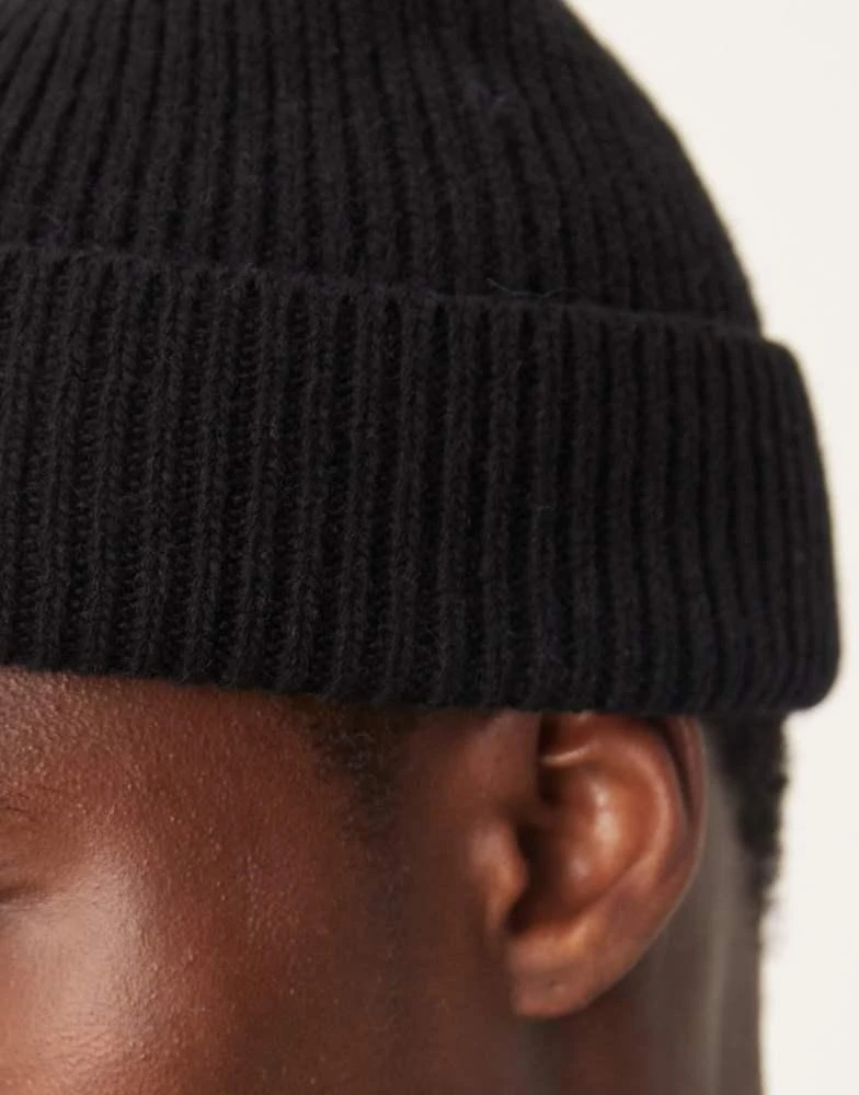 ASOS ASOS DESIGN lambswool fisherman ribbed beanie in black 3