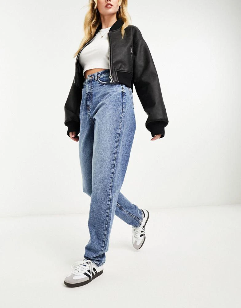 ASOS ASOS DESIGN high rise relaxed mom jeans in mid blue 6