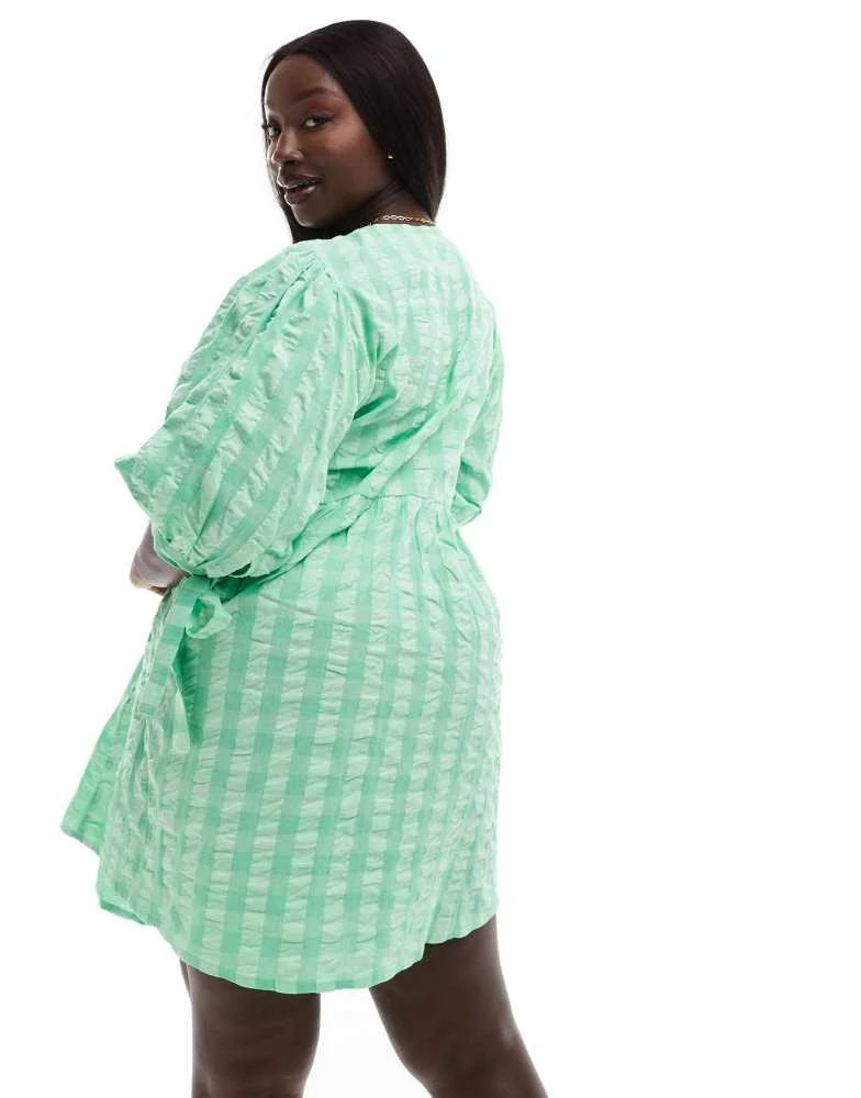ASOS ASOS DESIGN Curve wrap mini smock dress in bright gingham 4