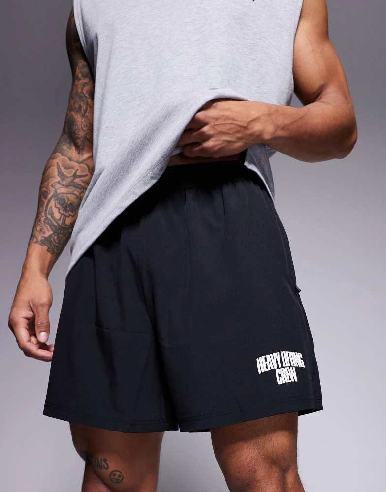 ASOS 4505 loose fit quick dry graphic training shorts with zip pockets in black 1