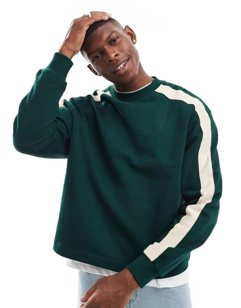 ASOS ASOS DESIGN boxy oversized sweatshirt with contrast side tape in dark green 1