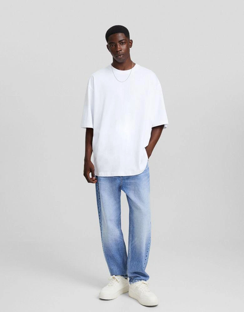 Bershka Bershka loose fit jeans in mid washed blue 3