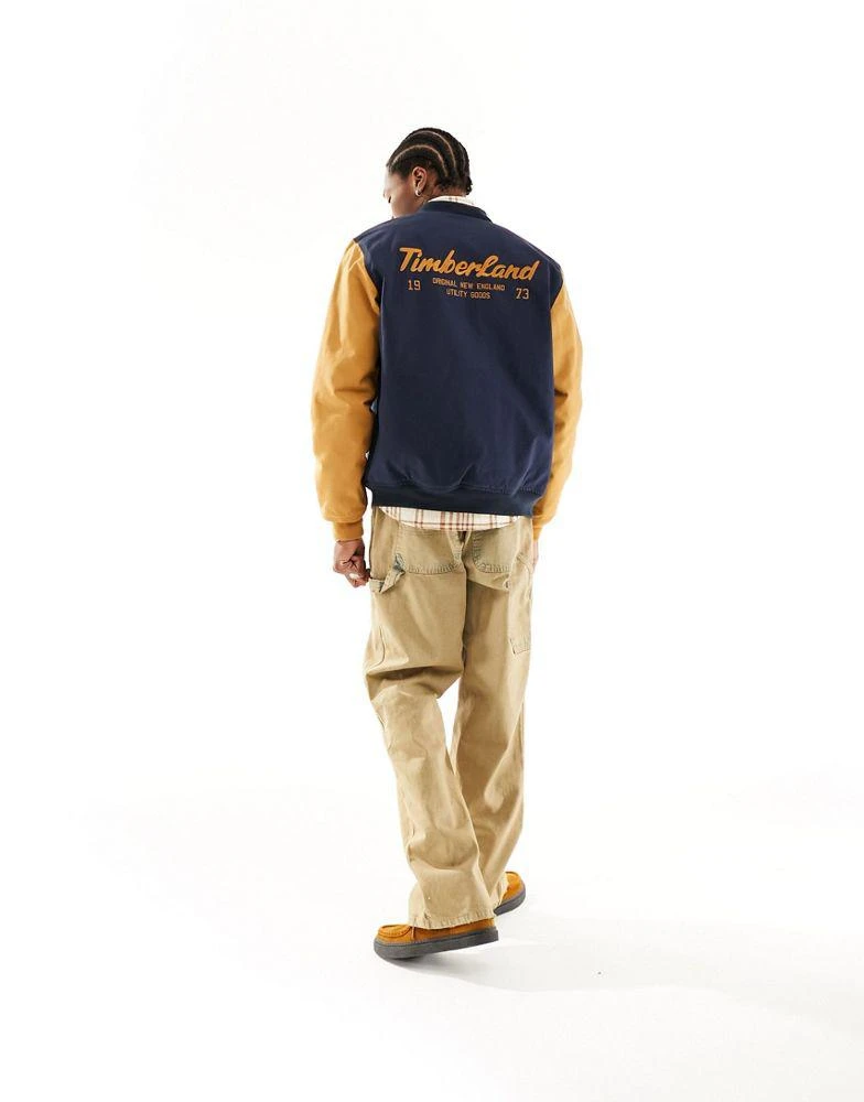 Timberland Timberland utility varsity bomber jacket with back print in navy with contrast sleeves 4