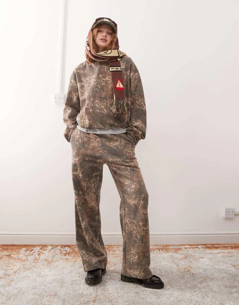 Weekday Weekday Davina co-ord oversized joggers with distressed tie dye print in khaki 1