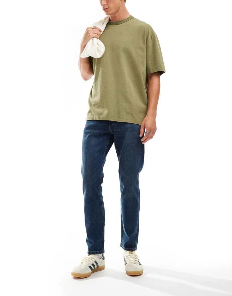 Levi's Levi's 502 tapered fit jeans in mid blue 4