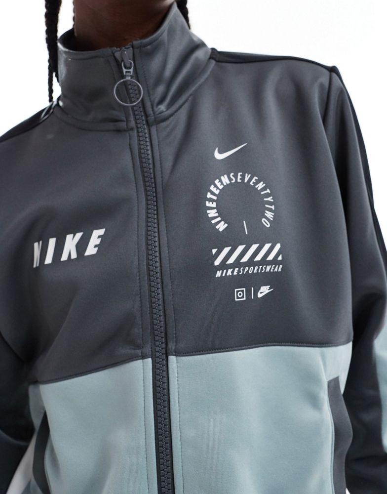 Nike Nike Streetwear woven jacket in grey and blue