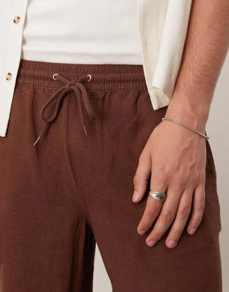 ASOS ASOS DESIGN baggy pull on shorts in brown linen rich 5