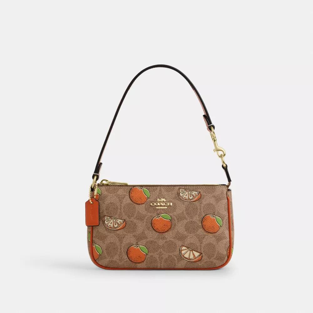 Coach Nolita 19 In Signature Canvas With Orange Print