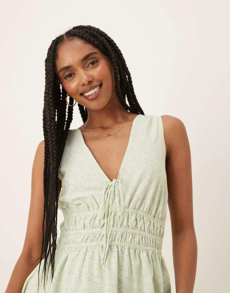 Glamorous Glamorous ruched strap mini dress in dtisy floral 4