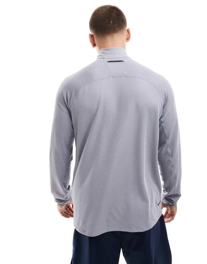 NIKE Nike Running Trail 1/4 zip sweatshirt in grey 4