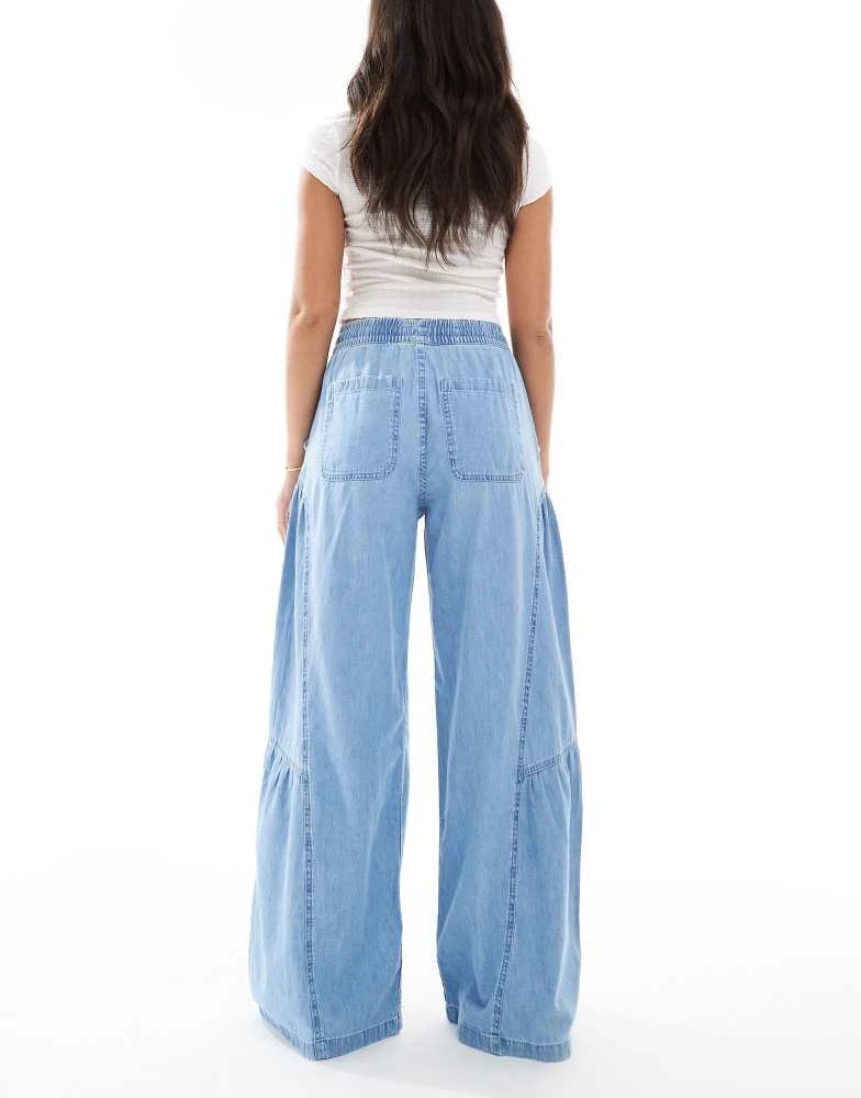 ASOS ASOS DESIGN soft wide leg pull on jean with stitch detail in mid blue 2