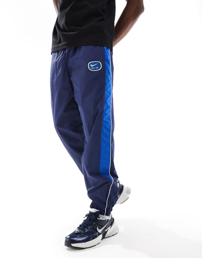 Asos Nike Club Casual Fit Cuffed Joggers In Navy NIKE Nike Swoosh