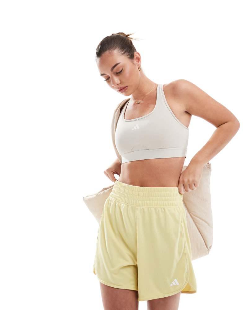 Adidas adidas Performance pacer essentials knit high-rise shorts in yellow