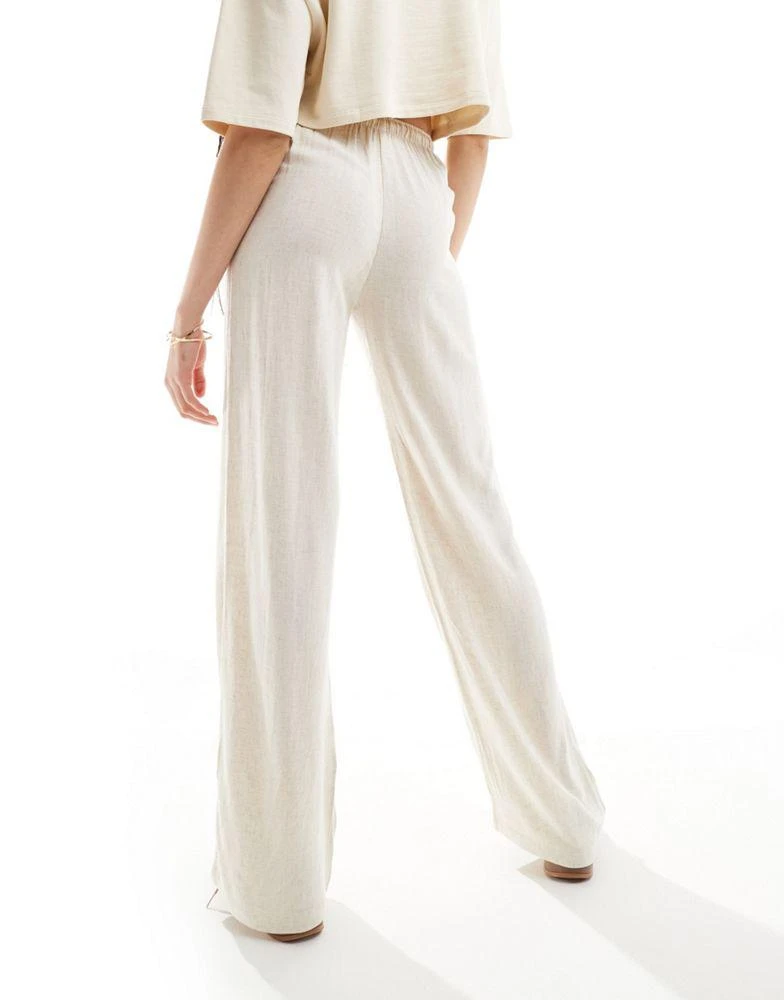Stradivarius Stradivarius Tall linen look pull on trouser in natural 2