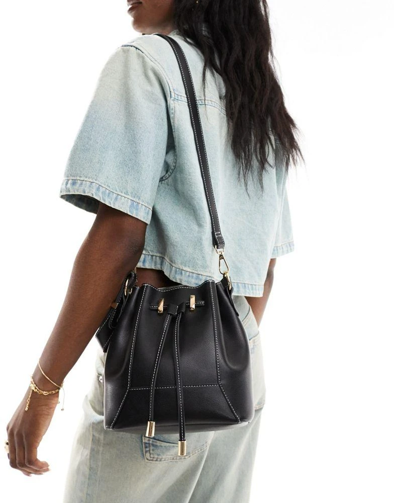 ASOS ASOS DESIGN bonded bucket bag with contrast stitch and removable crossbody strap in black 2