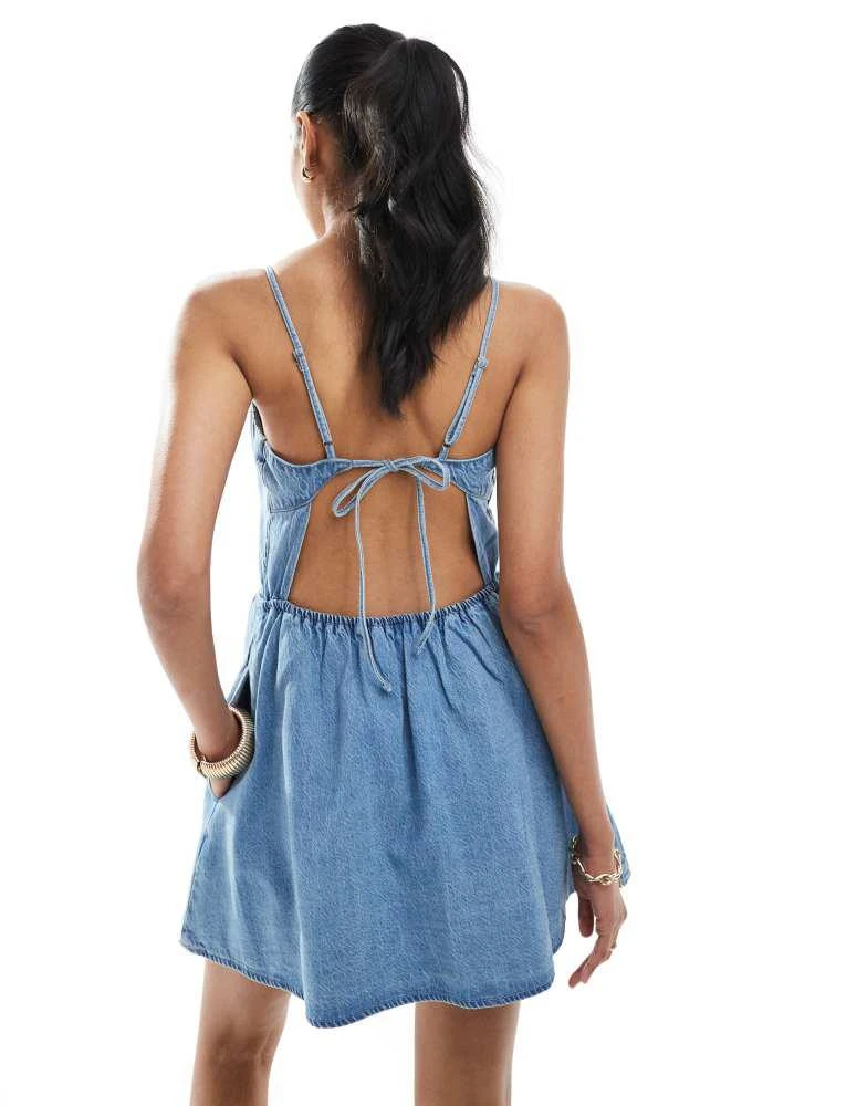 HOLLISTER Hollister drop waist sleeveless tie back mini dress in light wash denim 4