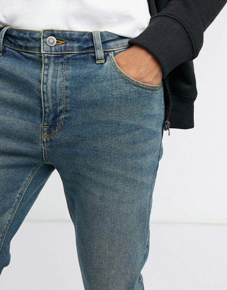 ASOS ASOS DESIGN skinny jeans in vintage mid wash blue 3