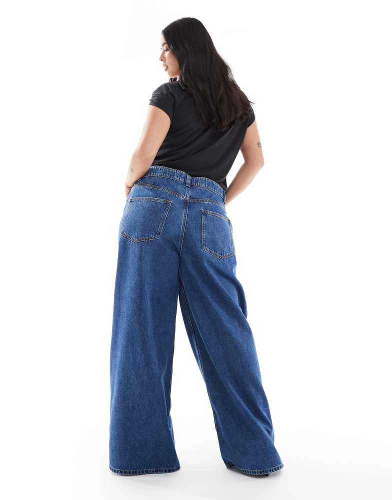 ASOS ASOS DESIGN Curve high waist wide leg jeans in midwash blue 3