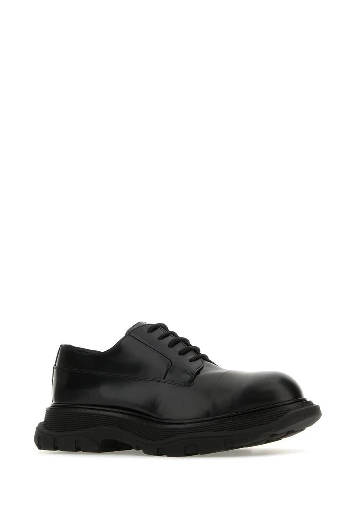 Alexander McQueen Black leather Tread lace-up shoes 1