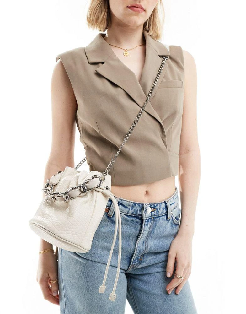 ASOS ASOS DESIGN bucket bag with detatchable crossbody strap in cream 1