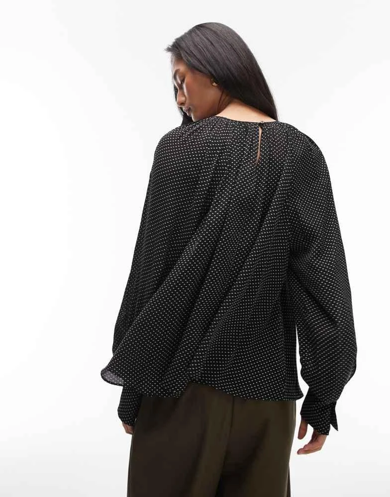 Other Stories
Other Stories chiffon volumen blouse top in black with white polka dots 4