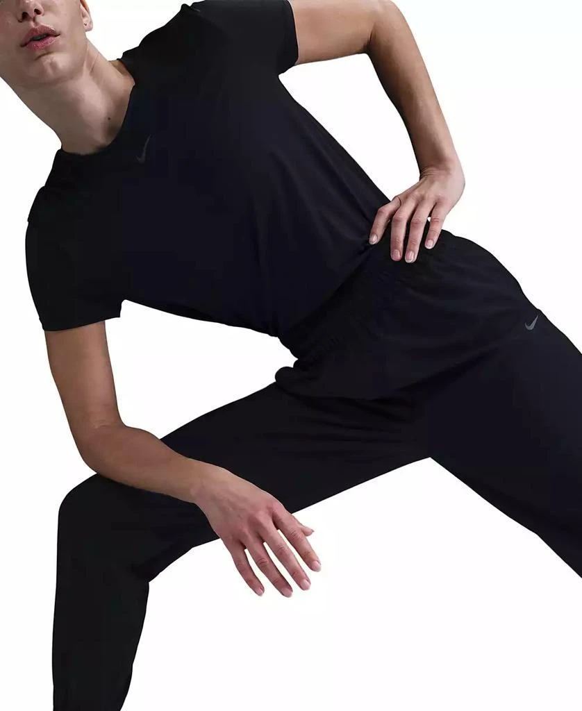 NIKE One Women's Dri-FIT Woven High-Rise 7/8 Joggers 3