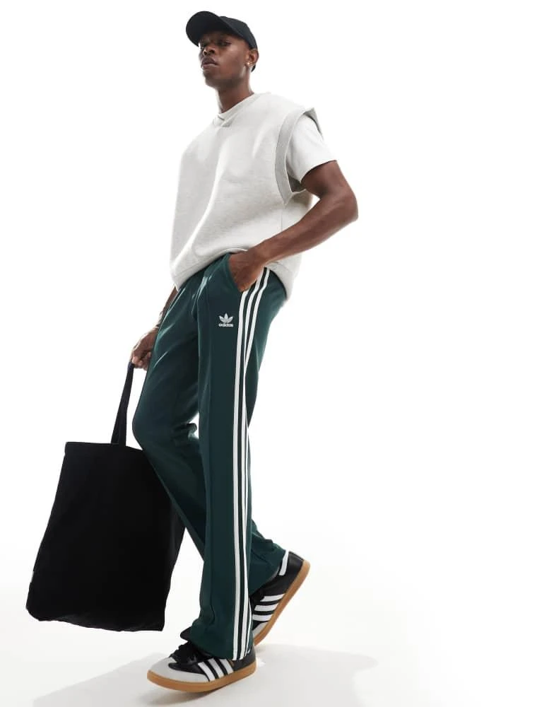 Adidas adidas Originals 70's tracksuit bottoms in mineral green 1