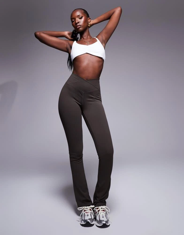 The Couture Club The Couture Club sculpting stretch emblem flare leggings in chocolate 1