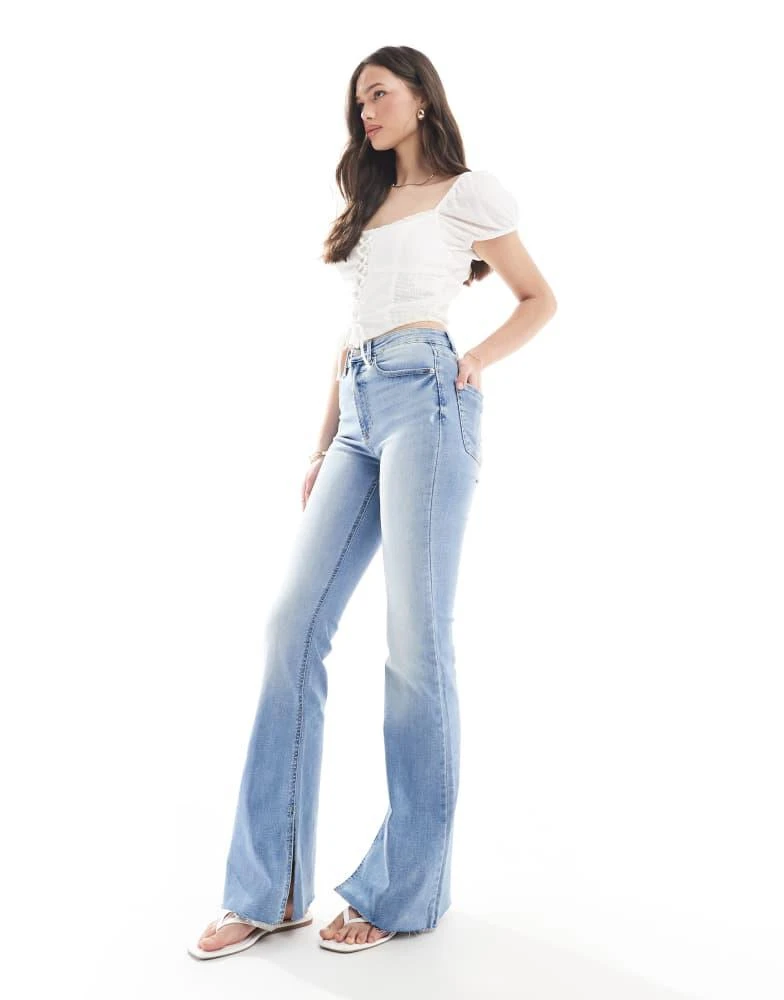 Stradivarius Stradivarius Tall D74 flare slit jean in medium wash 3