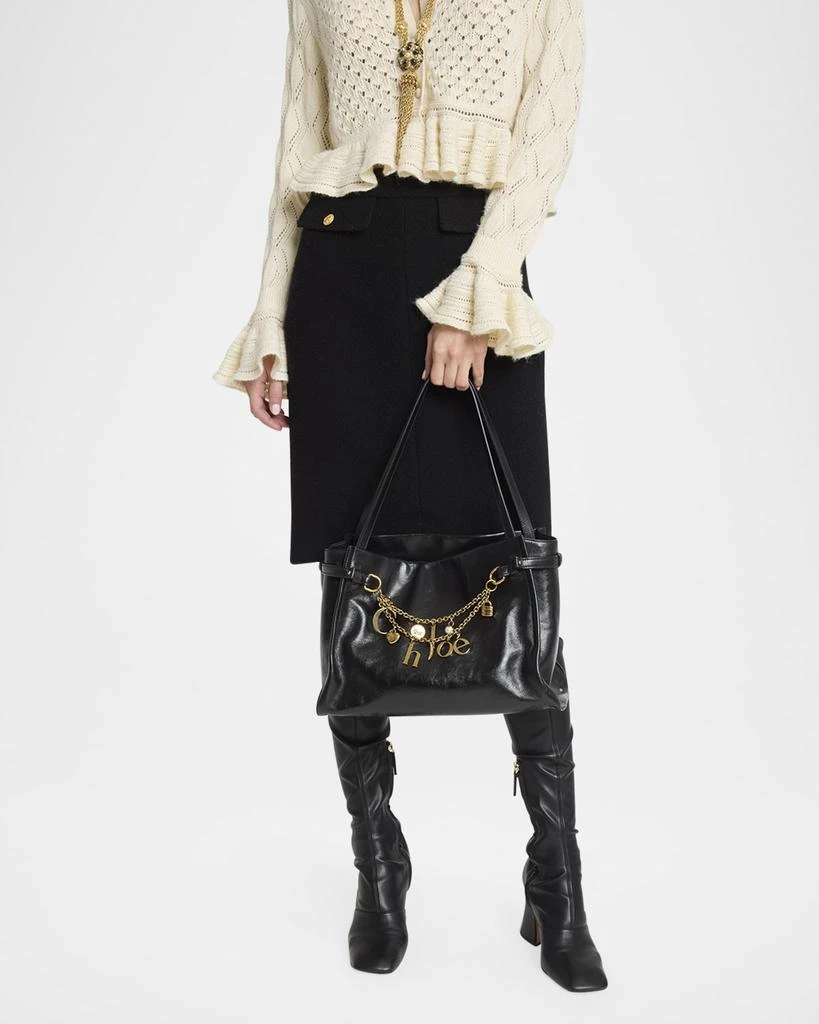 Shop Logo Charms Tote Bag in Shiny Leather on Sale at BeyondStyle