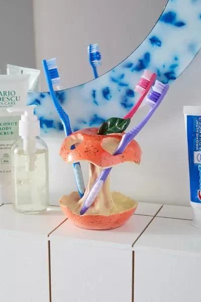 Urban Outfitters Trash Apple Toothbrush Holder 1