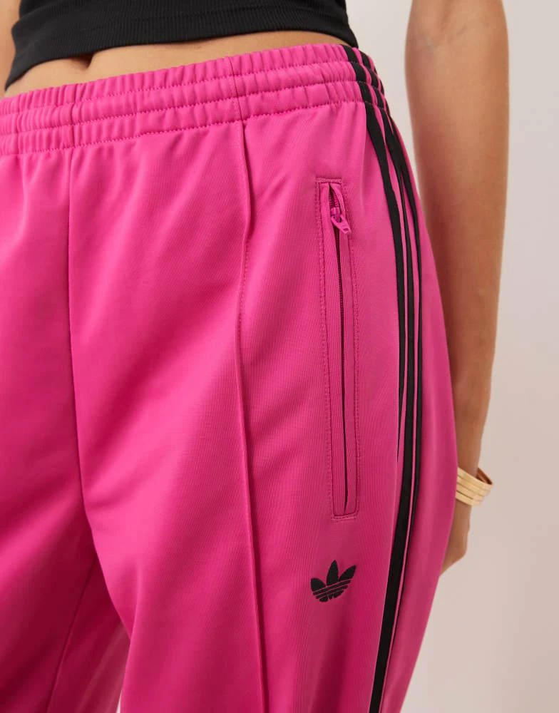 Adidas adidas Originals Adicolor classic firebird loose track pants in fuchsia and black 3
