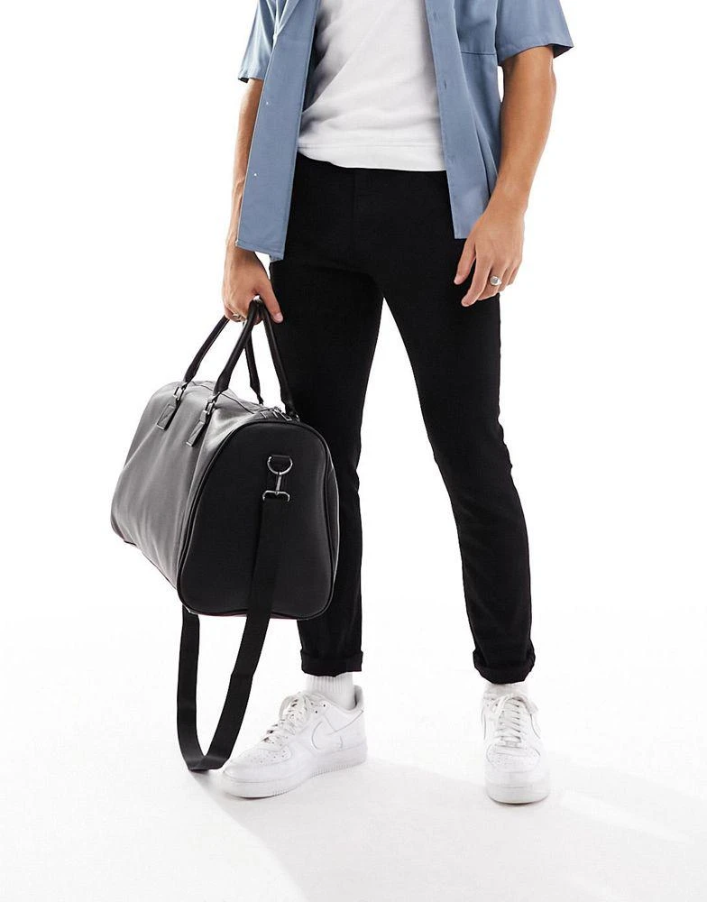 ASOS ASOS DESIGN smart faux leather weekend holdall bag in black 1