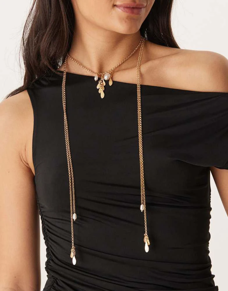 ASOS ASOS DESIGN multirow necklace with long tassel detail in gold tone from ASOS