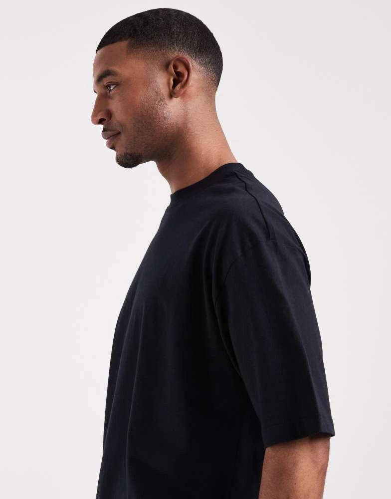 ASOS ASOS DESIGN oversized t-shirt with souvenir graphic in black 4