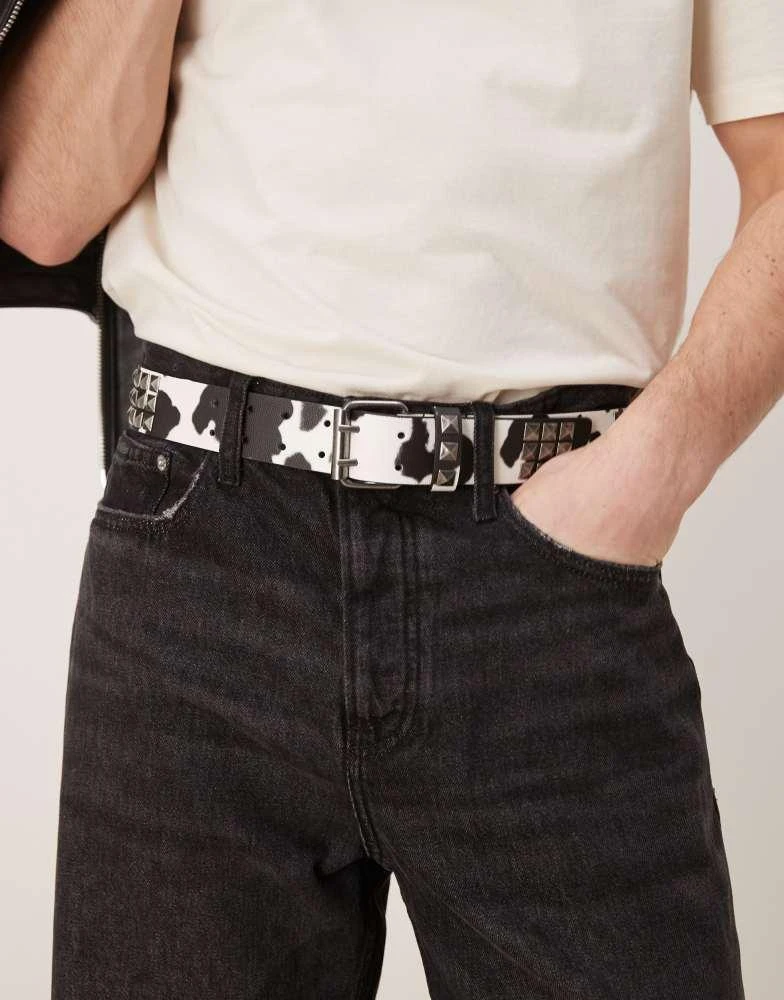 ASOS ASOS DESIGN cow print studded belt in faux leather 1