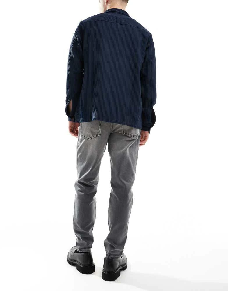 ASOS ASOS DESIGN tapered fit jeans in washed black 2
